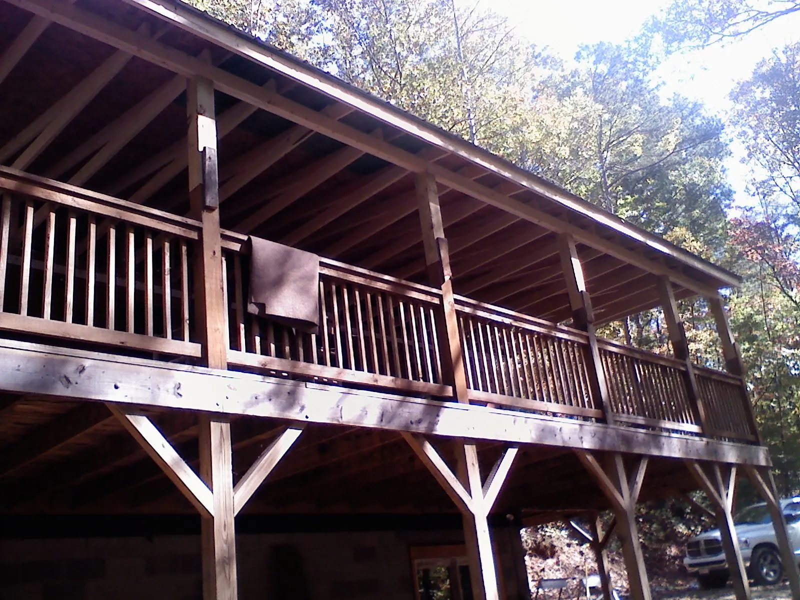 Timber framing under a new elevated porch and deck — Roof Leak Repair in Emden by Roofing Brothers